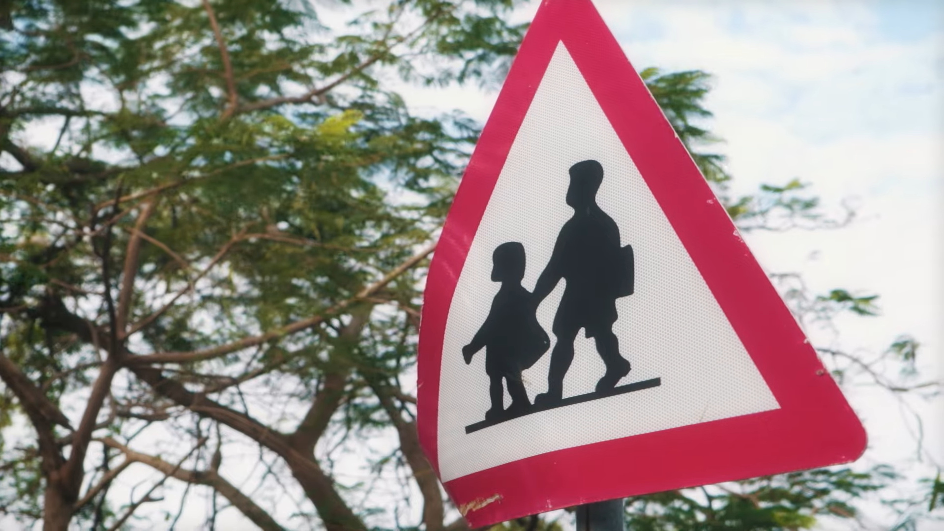 A school crossing sign.